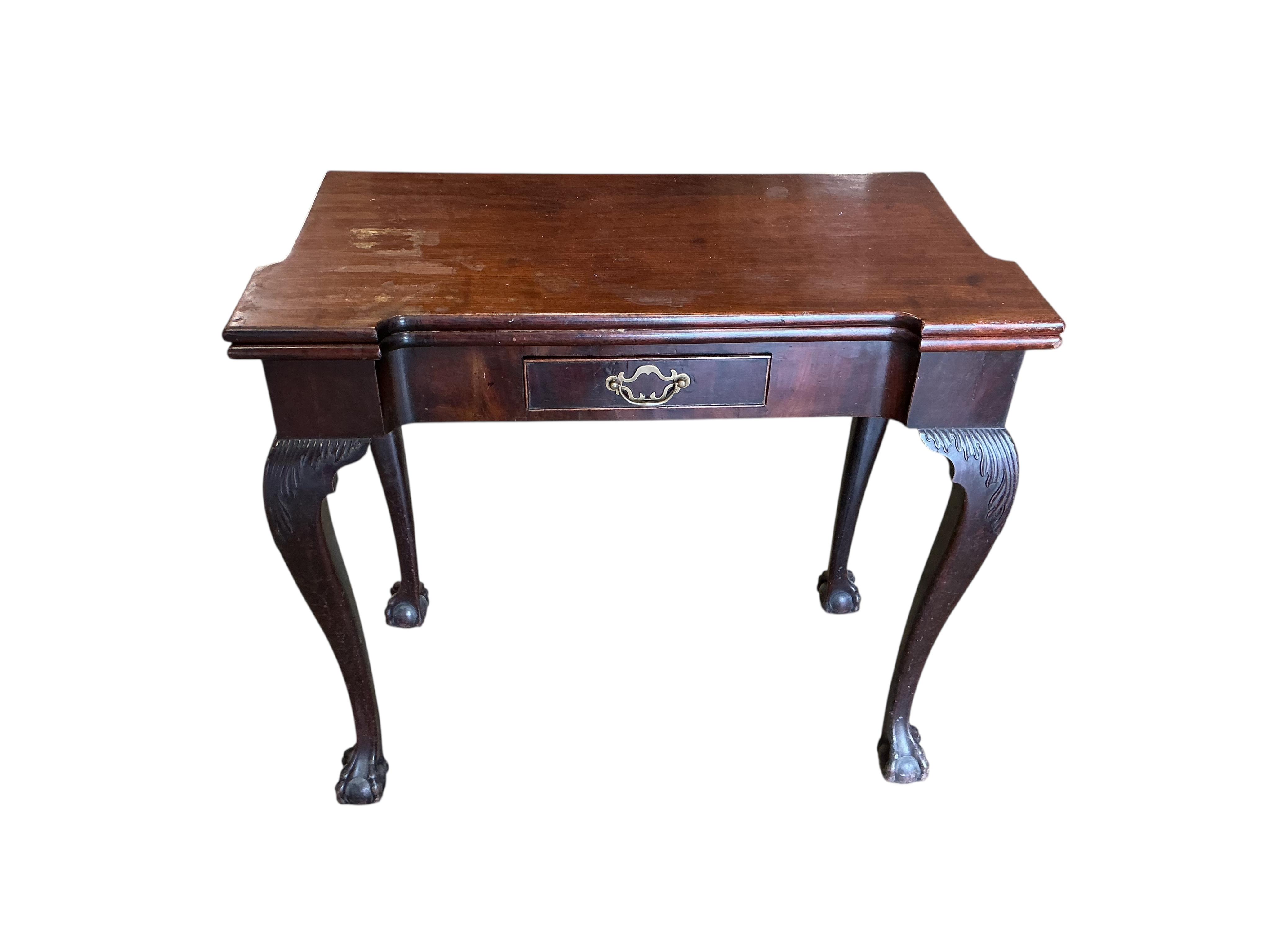 An 18th century rectangular mahogany folding tea table, width 80cm, depth 40cm, height 72cm